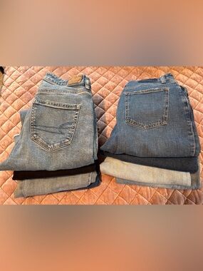 Stack of Light, Medium, and Dark Wash Jeans